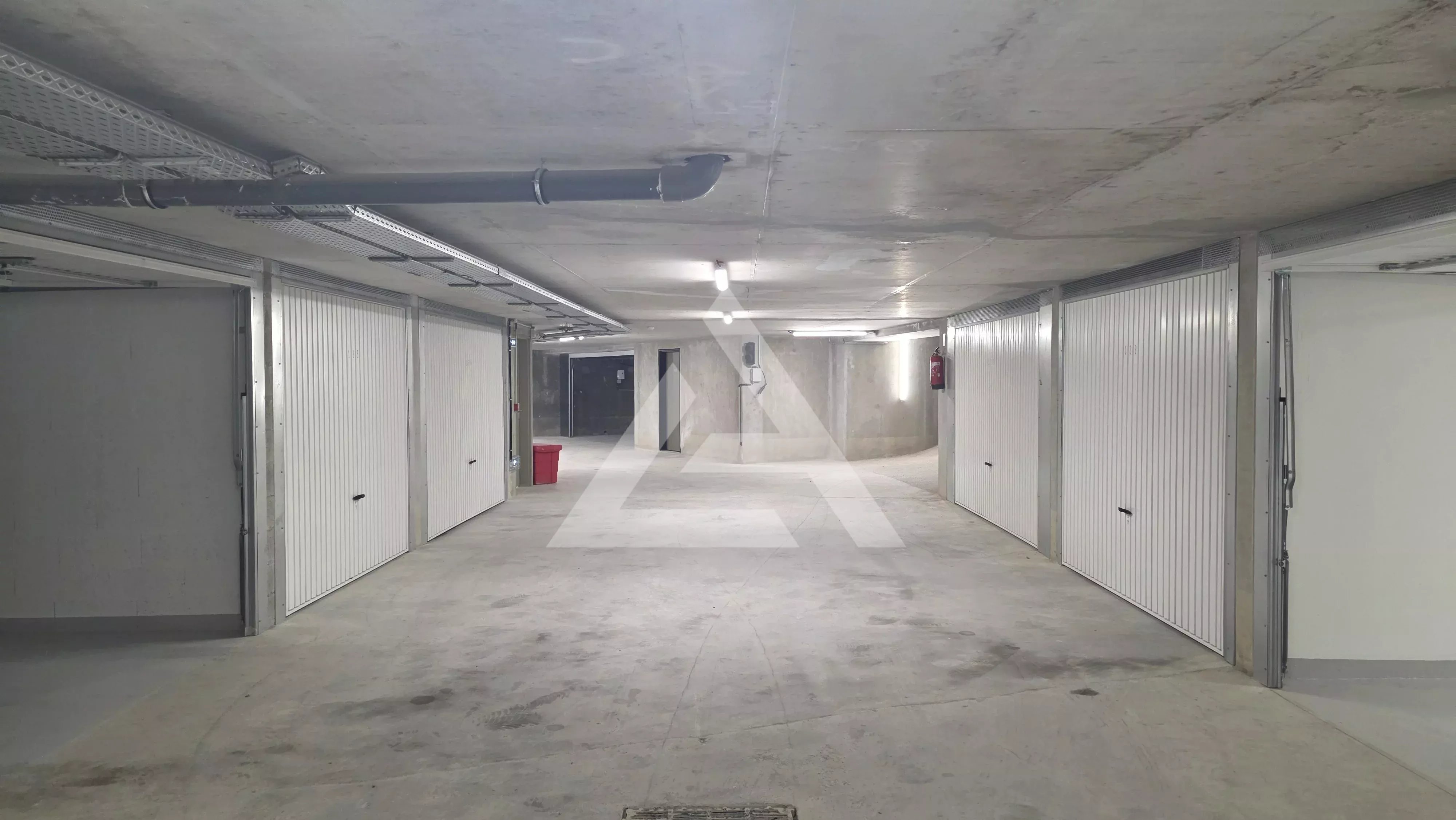 CAP D'AIL - DOUBLE GARAGE EN SOUS-SOL - RESIDENCE NEUVE EN CENTRE-VILLE